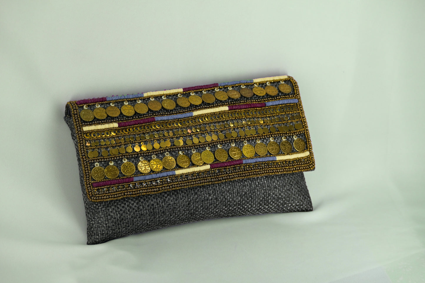 Coin work antique jute clutch with sling