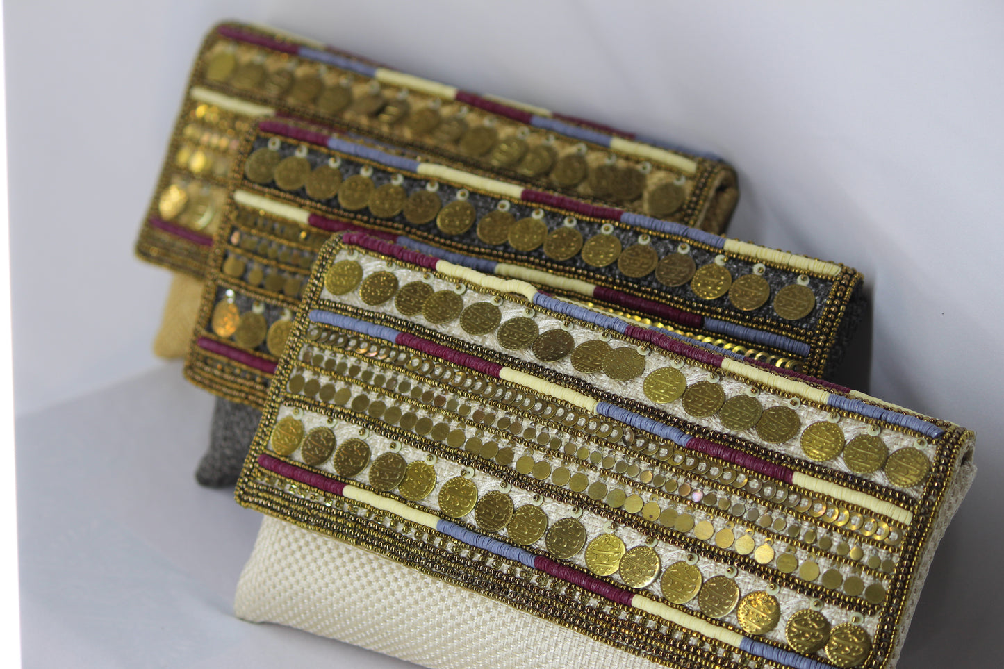 Coin work antique jute clutch with sling
