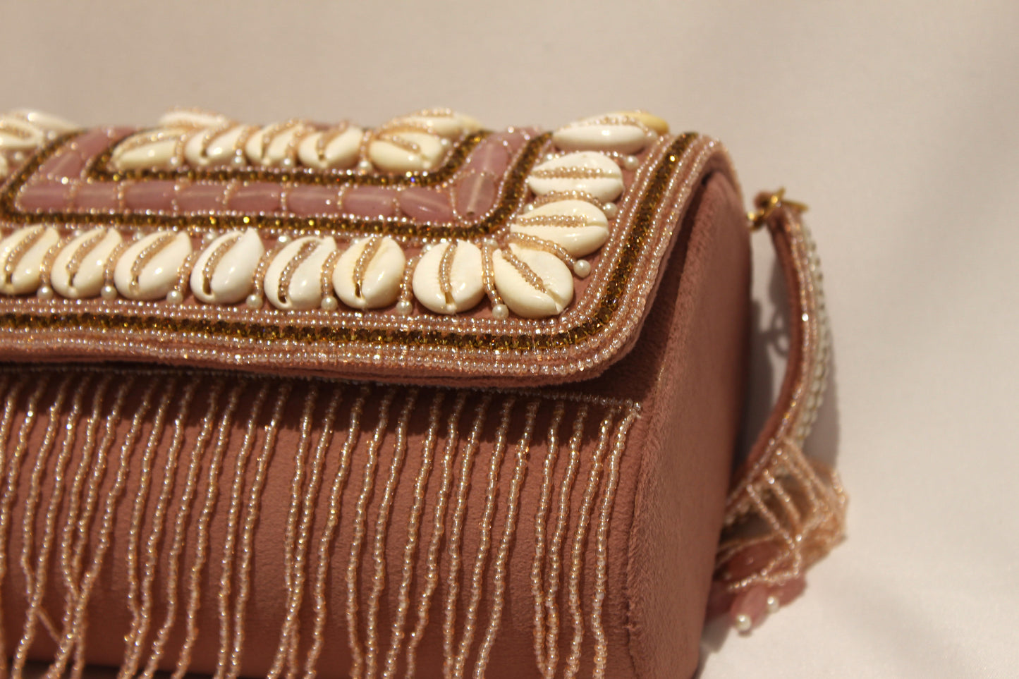 Pearl and beads embellished clutch with sling