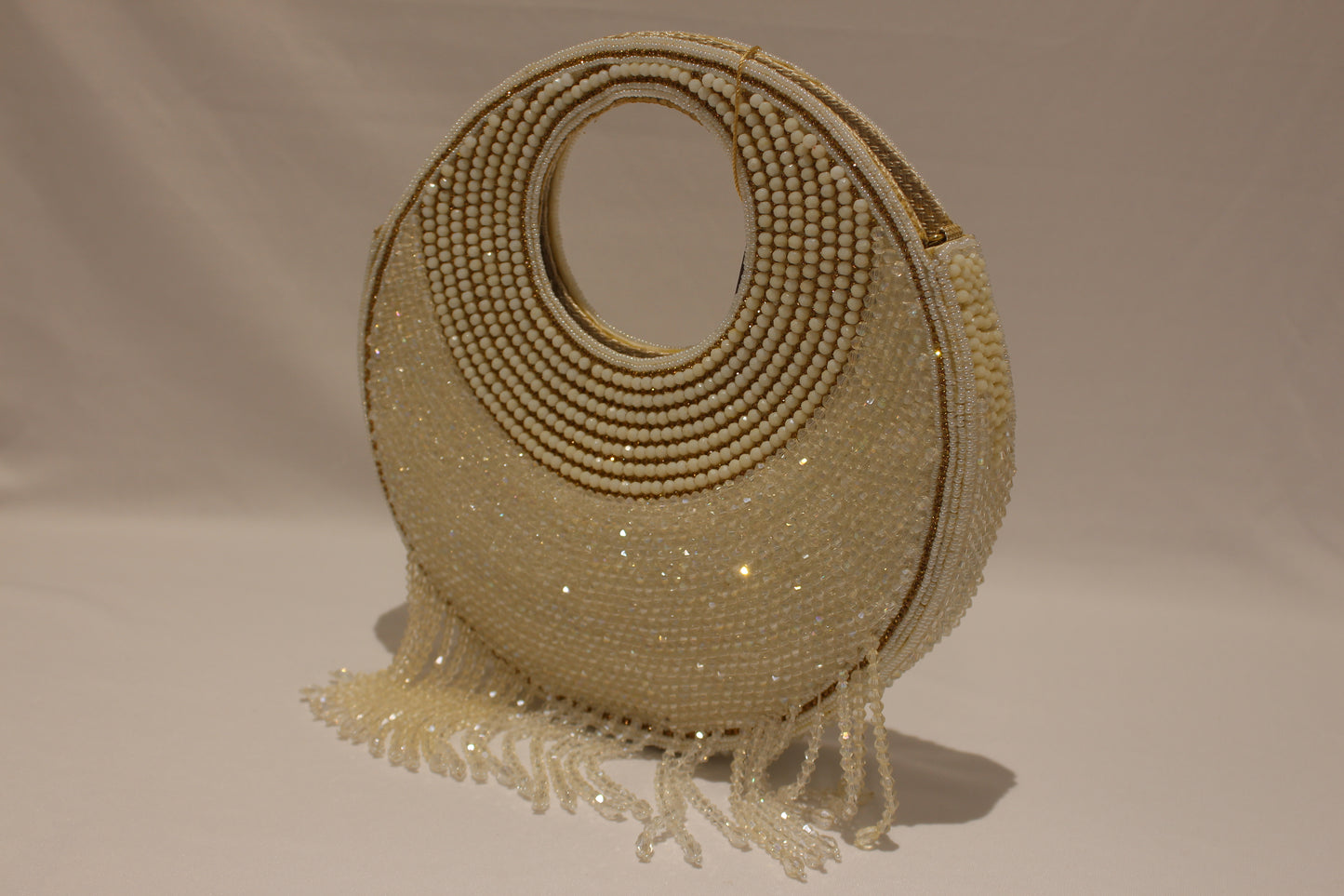 Round shaped white clutch