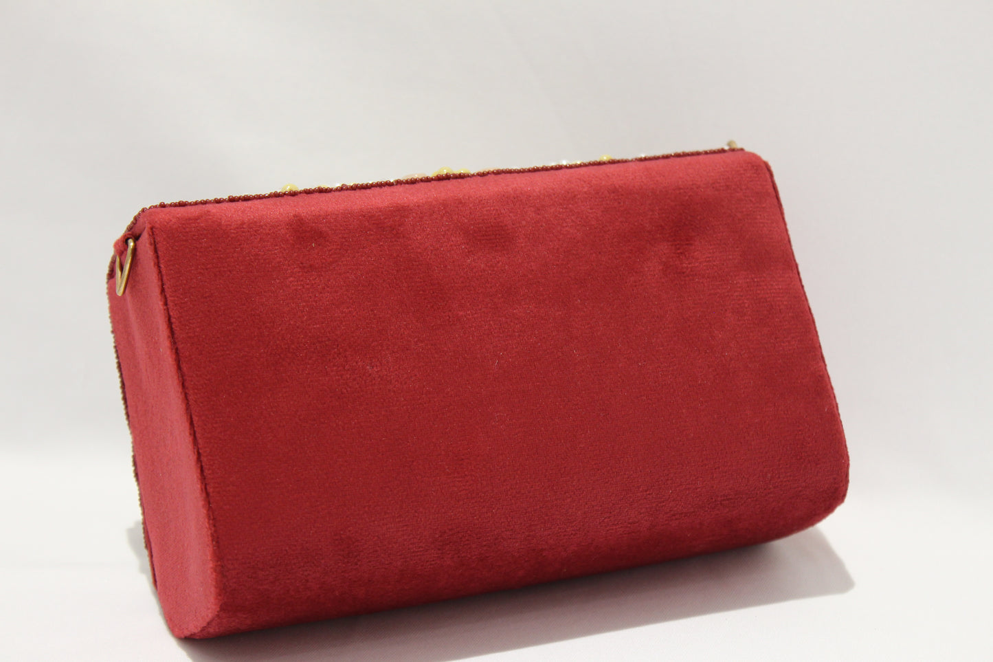 Embellished clutch with sling & handle