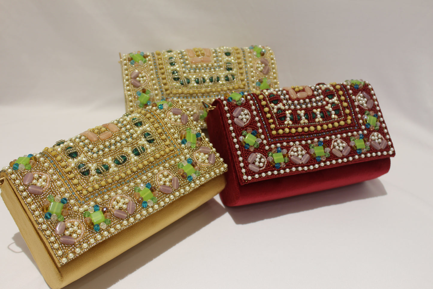 Embellished clutch with sling & handle