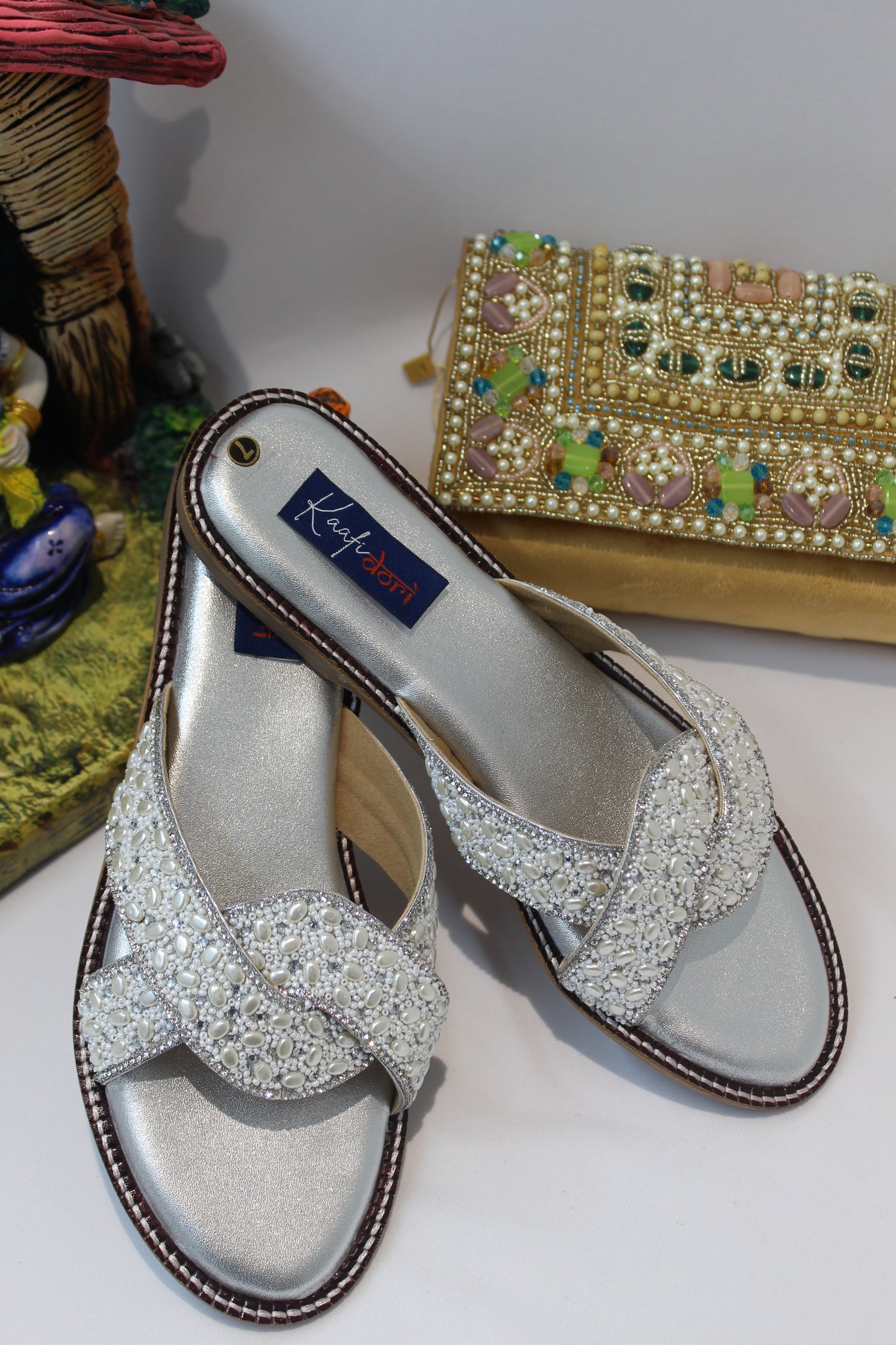 Silver flats by Kaafi Dori