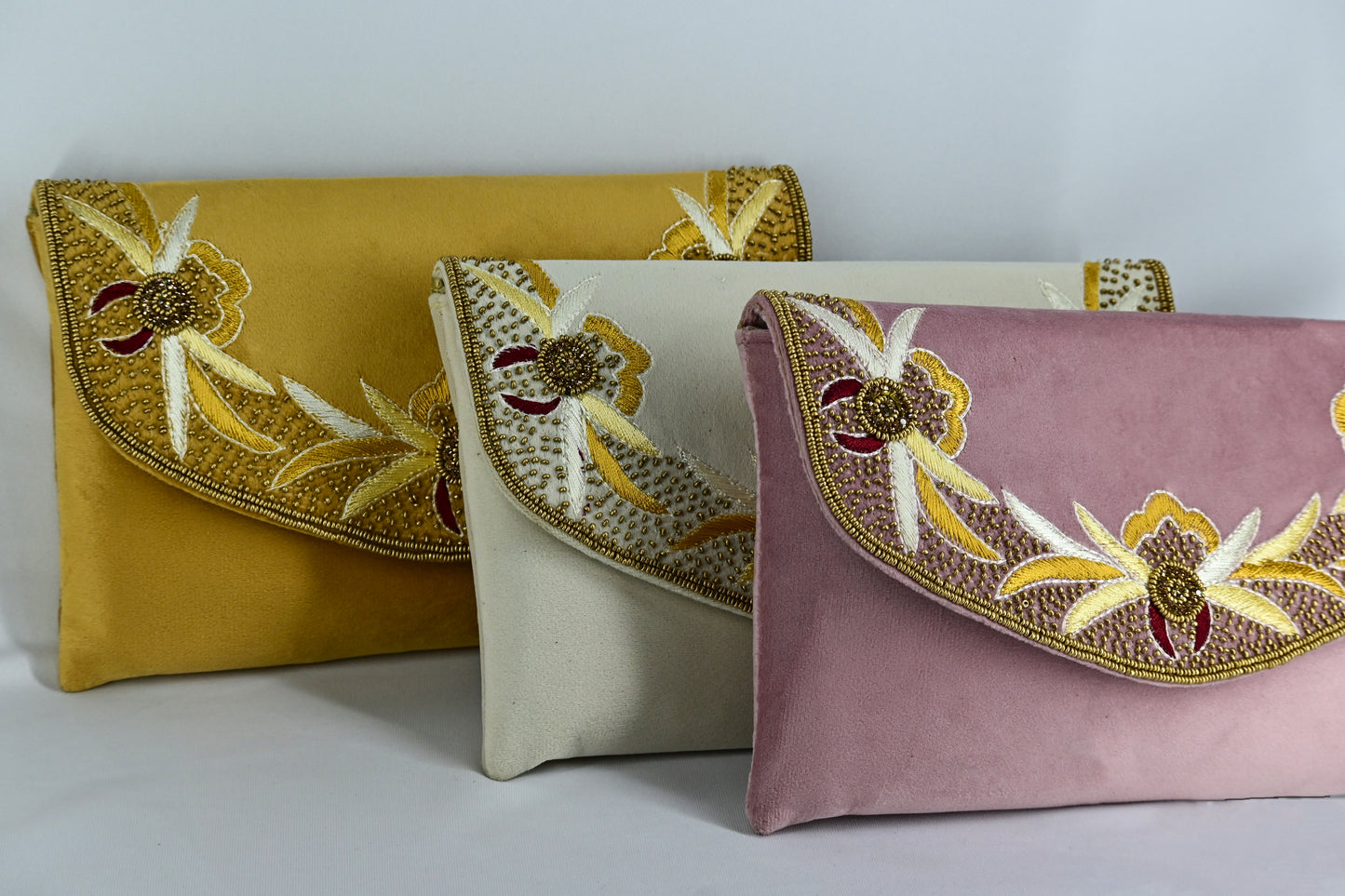 Embroidery velvet clutch with sling