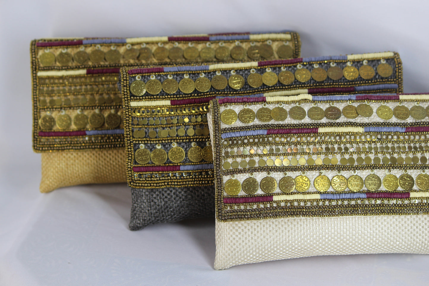 Coin work antique jute clutch with sling