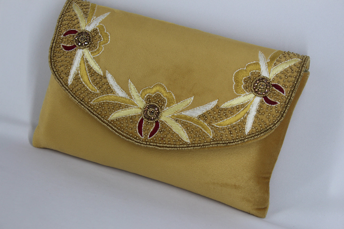 Embroidery velvet clutch with sling