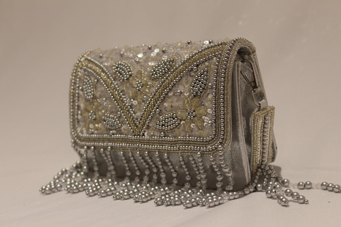 Embellished pearl clutch with handle & sling
