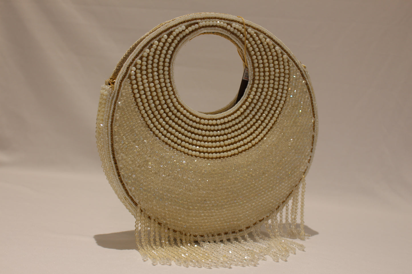 Round shaped white clutch