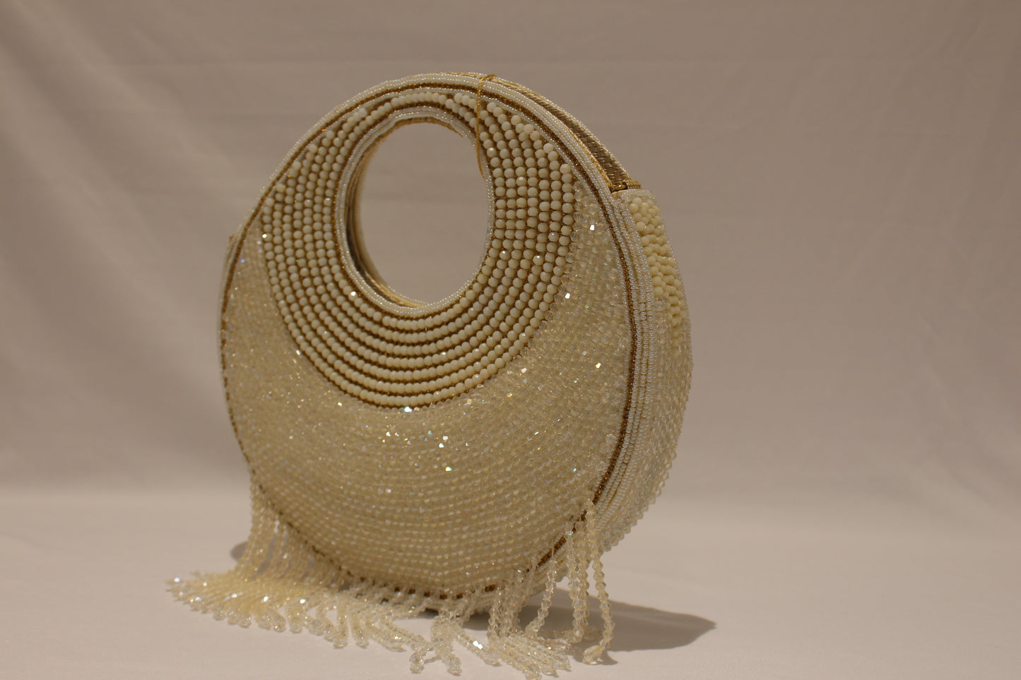 Round shaped white clutch