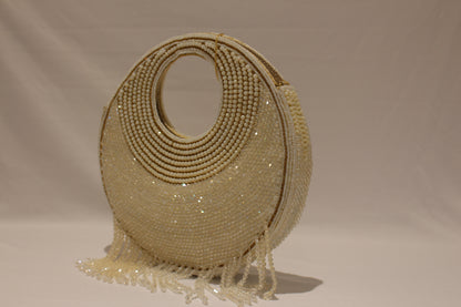 Round shaped white clutch