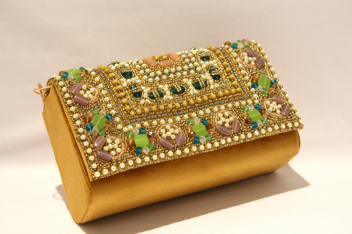 Embellished clutch with sling & handle
