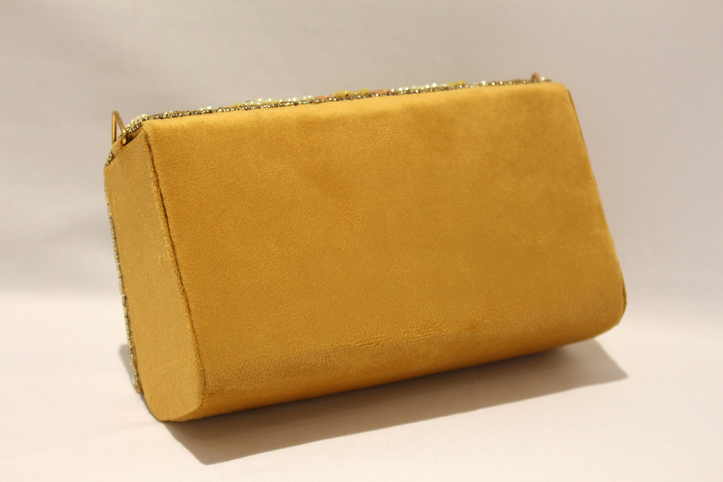 Embellished clutch with sling & handle